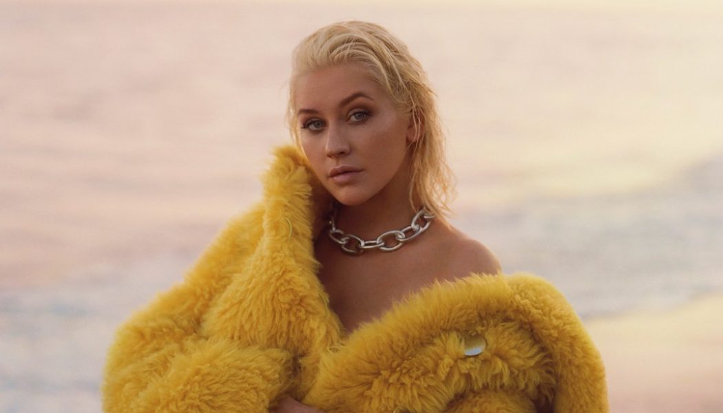 Christina Aguilera Loves Kim Kardashian Channeling Her ‘Dirrty’ Aesthetic in White Bikini & Chaps