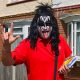 Mail Carrier Dresses Up as KISS’ Gene Simmons to Lift Spirits During Pandemic