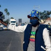 Zimbabwe street vendors sell cloth masks to make ends meet