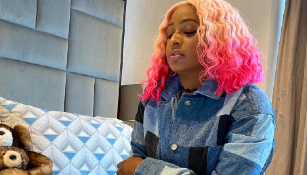 DJ Cuppy receives signed Manchester United jerseys from Ighalo as she joins the club