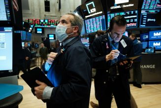 Dow sinks 1,600 as virus cases rise, deflating optimism