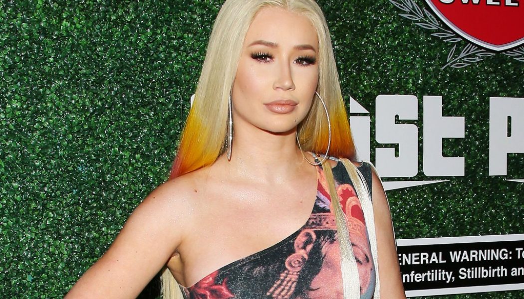 Iggy Azalea Teases New Music, Shows Off Tiny Post-Baby Waist in Tie-Dye Dress