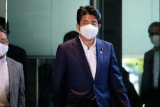 Japan’s premier returns from hospital, says to do his best at his job