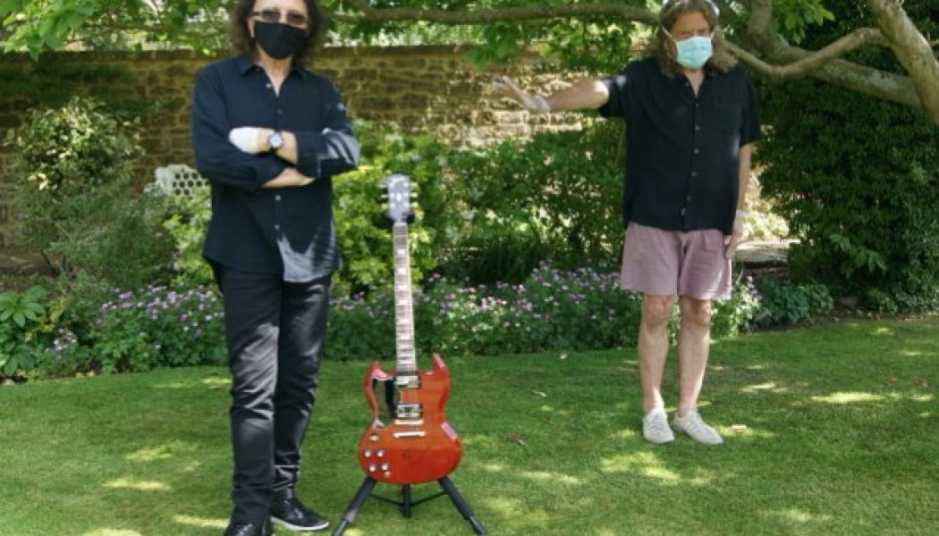 Photo: Masked TONY IOMMI And ROBERT PLANT Autograph Guitar For ‘MusiCares Charity Relief Auction’