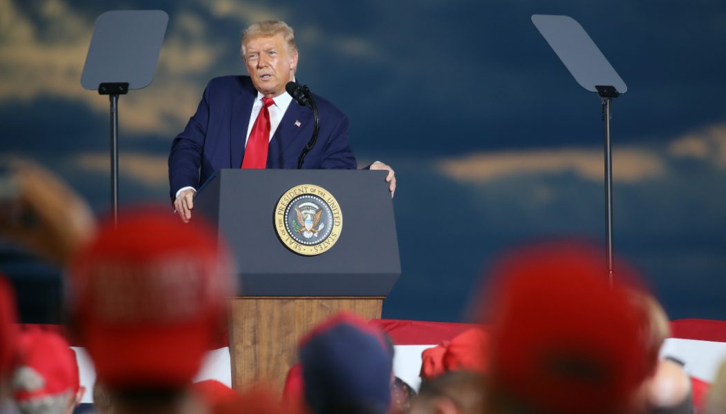 Trump tries to dance around a devastating backdrop