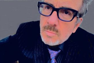 Elvis Costello Shares New Jazzy Cut ‘Hey Clockface’/’How Can You Face Me Now?’