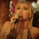 Watch Miley Cyrus Cover Pearl Jam’s ‘Just Breathe’ During Backyard Sessions