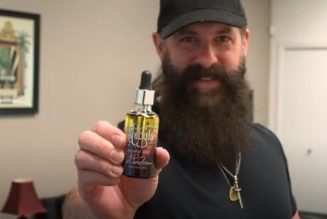 DREAM THEATER’s JOHN PETRUCCI Unboxes His Signature Range Of Specialty Beard And Mustache Products (Video)