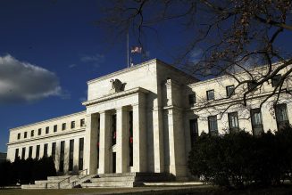 Fed sees less severe recession this year but warns of tough winter