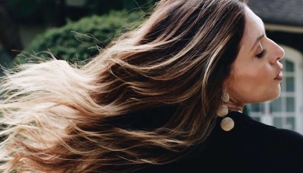 I’m 54 and Always Get Complimented on My Thick, Shiny Hair—Here Are My Secrets