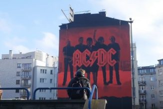 Watch Massive AC/DC ‘Power Up’ Mural Being Painted In Warsaw, Poland