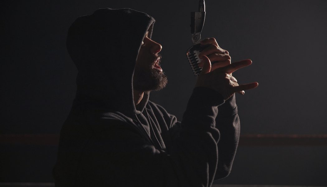 Eminem Prepares to (Literally) Fight His Demons in ‘Higher’ Video