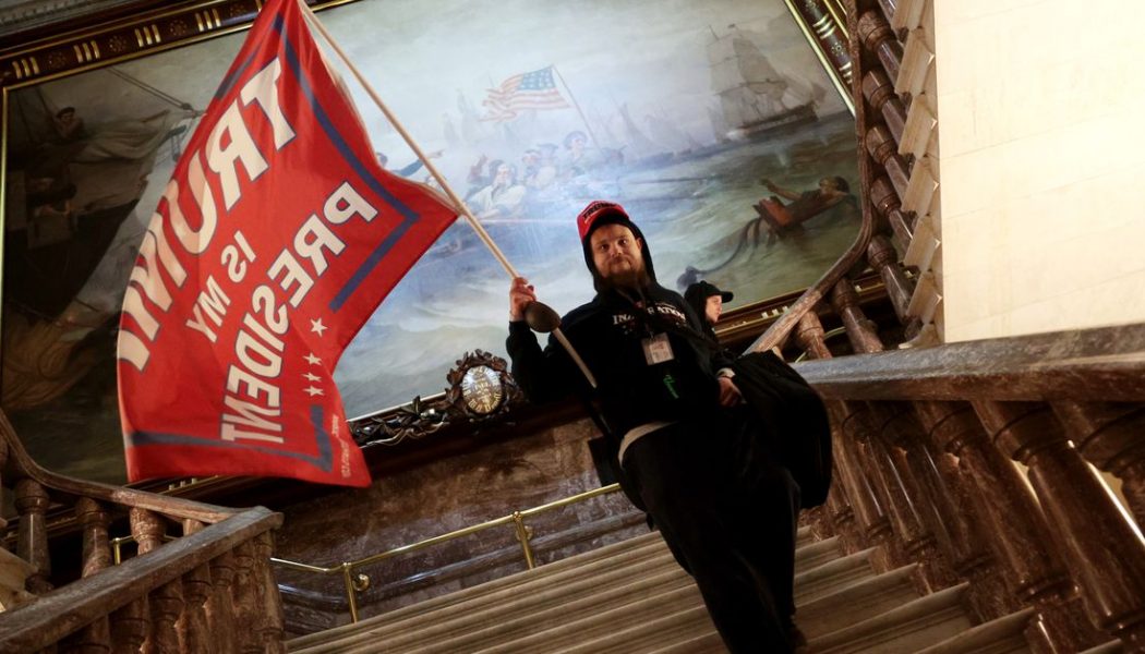 US Capitol enters lockdown as pro-Trump protesters storm building