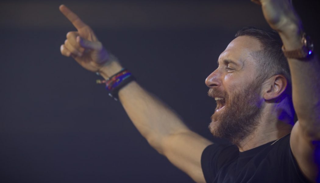 Watch David Guetta Shower the Louvre in Lights in Breathtaking NYE Charity Performance