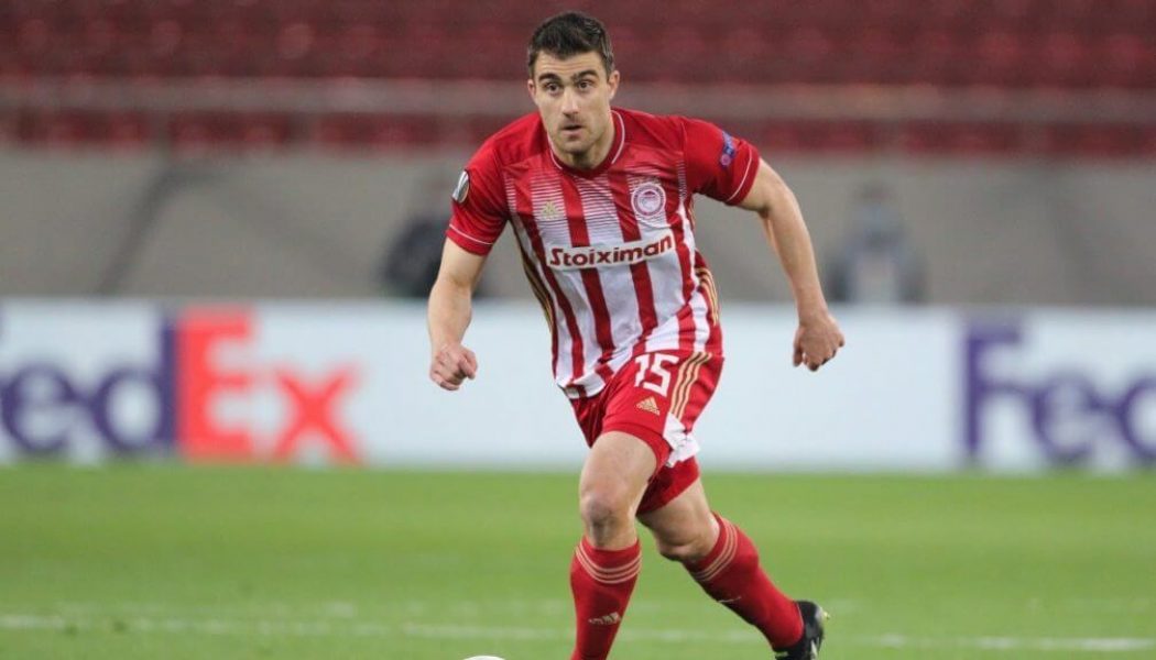 Sokratis reacts after Olympiacos are drawn with Arsenal in the Europa League last 16