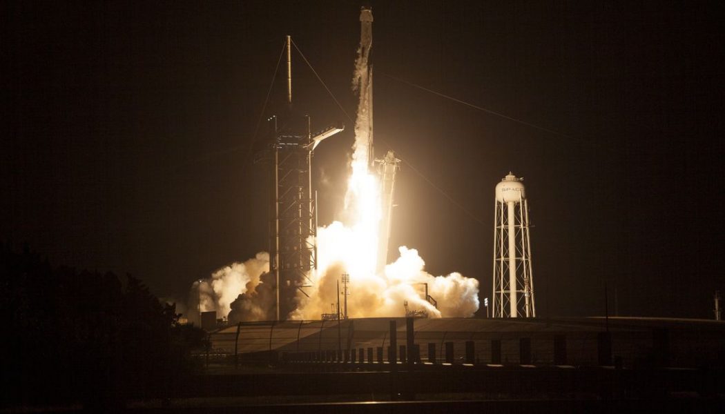 SpaceX capsule with four astronauts on board docks with the International Space Station