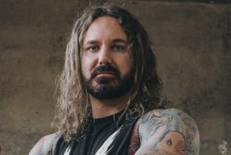 AS I LAY DYING’s TIM LAMBESIS Sued By Woman For Burns Suffered From Bonfire