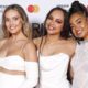 Little Mix Celebrate Their Baby Bumps in Angelic White Gowns at the BRIT Awards