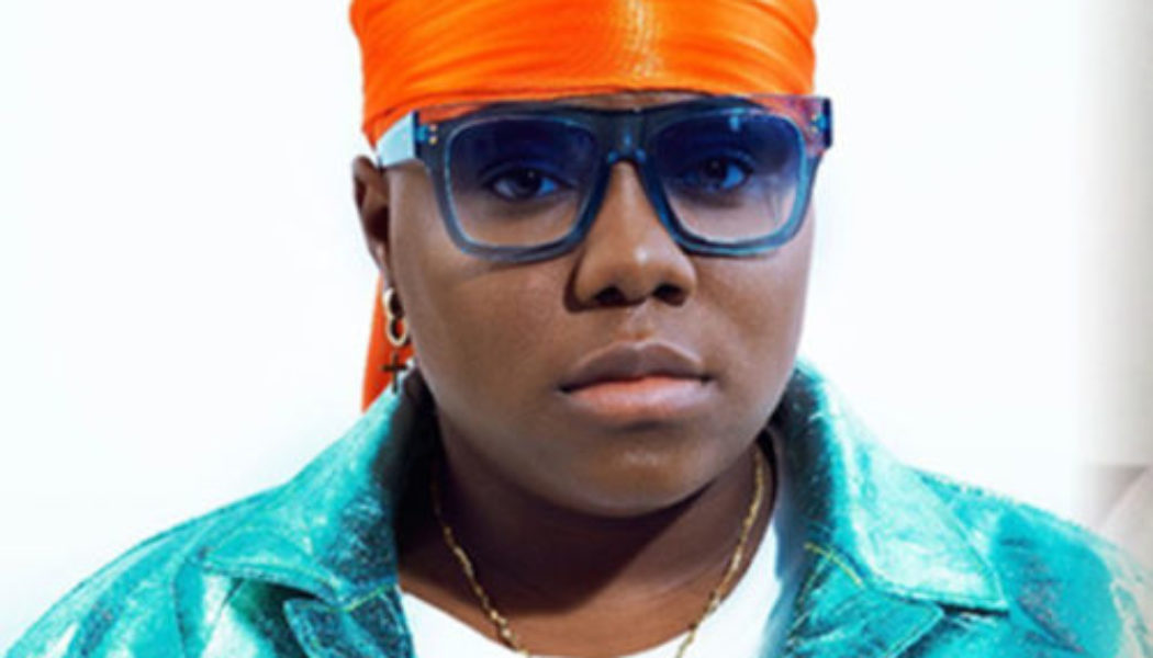 Singer Teni Shares BTS Video Of “Hustle” As She Hangs From A Car