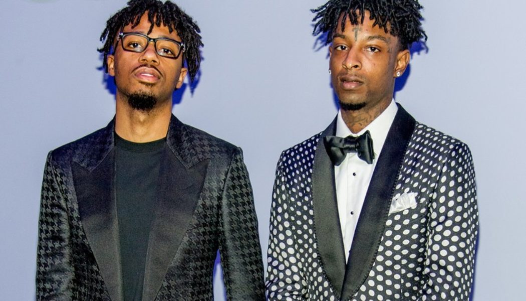 21 Savage and Metro Boomin Make It Big on the Stock Market in ‘Brand New Draco’ Music Video