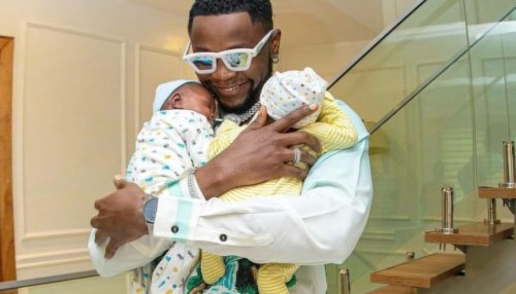 Kizz Daniel buys a penthouse each for his baby boys