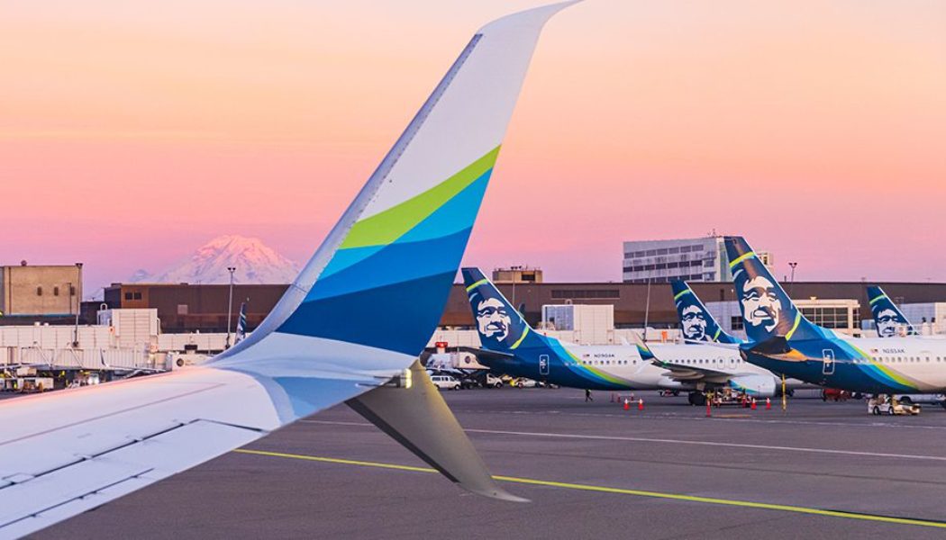 Alaska Airlines evacuated a plane after a phone burst into flame