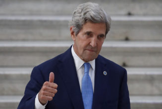 Kerry in Japan to discuss effort to cut emissions