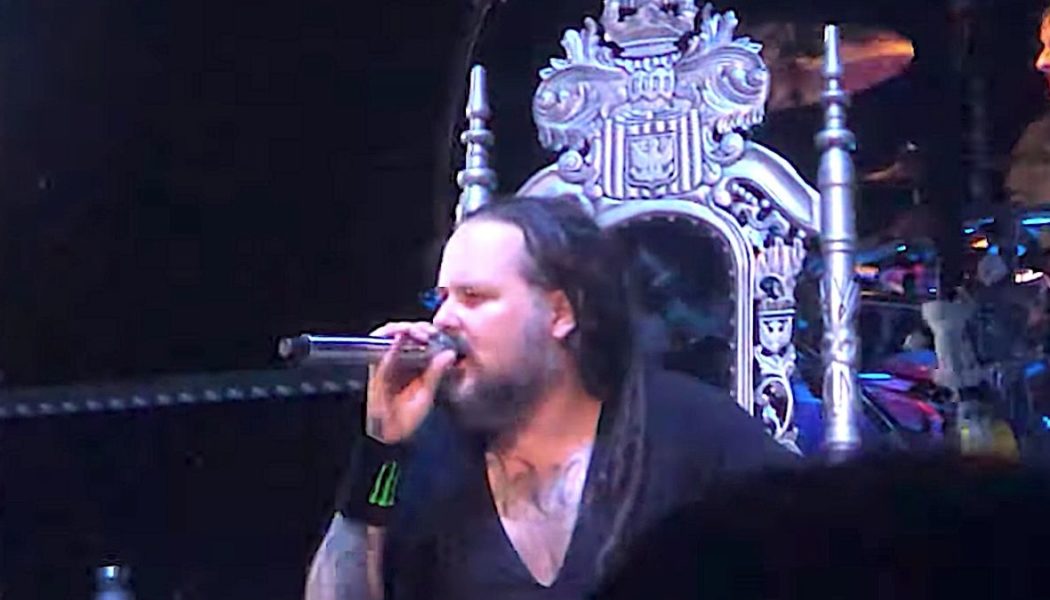 Korn’s Jonathan Davis “Struggling with COVID After-Effects,” Sits on Throne While Performing