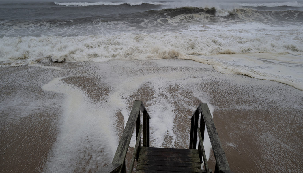 Moving inland, Tropical Storm Henri drenches Northeast