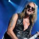 Judas Priest’s Richie Faulkner Hospitalized with “Major Heart Condition Issues,” Band Postpones Tour Dates