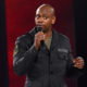 Netflix Defends Dave Chappelle Doc & Suspends Protesting Staffers