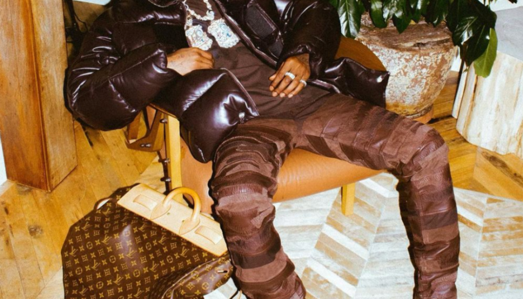 Travis Scott Flexes Another Air Jordan 1 Low Collab