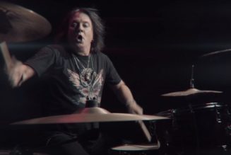 SCOT COOGAN Accuses PHIL LEWIS Of ‘Conjuring Up’ Reason For Drummer’s Decision To Leave Band