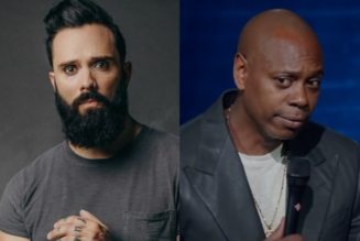 SKILLET’s JOHN COOPER Defends DAVE CHAPPELLE Over LGBTQ+ Controversy: ‘He’s Outrageously Hilarious’