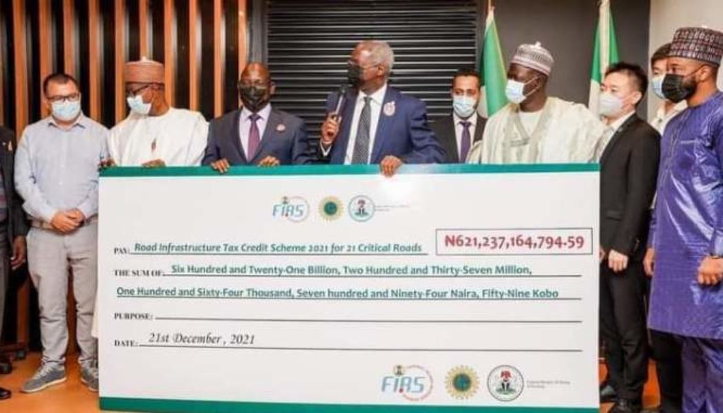 NNPC hands over a symbolic cheque of N621.24 Billion for the rehabilitation of 21 critical roads across the country