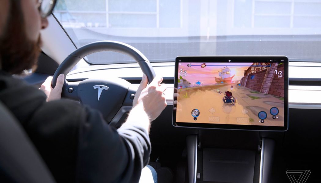 Tesla investigated over reports drivers can play its video games while vehicles are moving