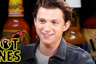 Tom Holland Takes Double Bites of the Spiciest Wings on ‘Hot Ones’