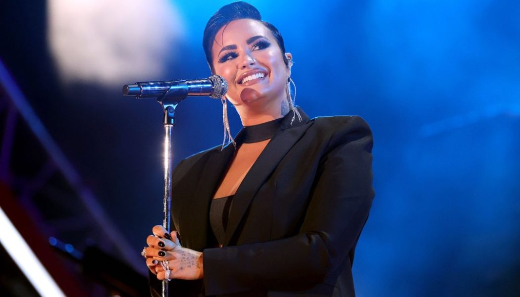 Demi Lovato Hosts ‘Funeral’ Mourning Their Pop Music, Teases New Rock Song