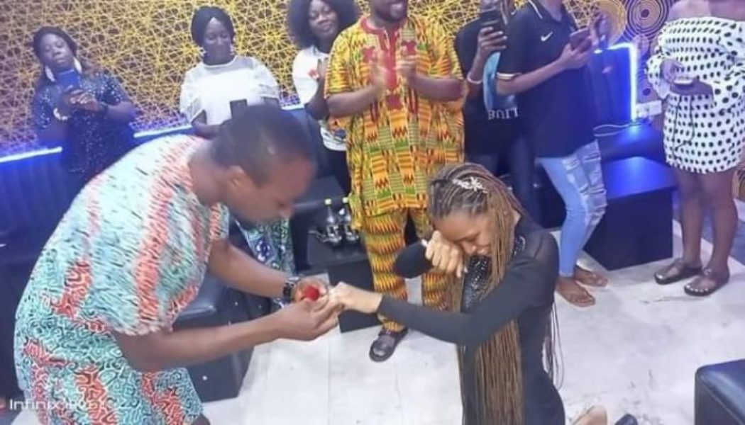 PHOTOS: Newly-engaged Couple Trends As Lady Kneels To Accept Ring