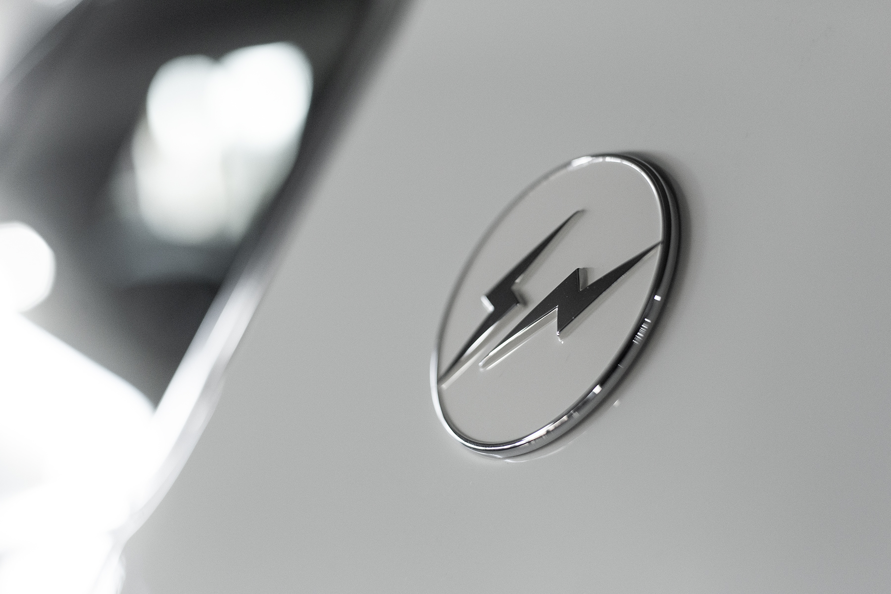 fragment design x Maserati Ghibli Open Road Review Hiroshi Fujiwara branding black white panda