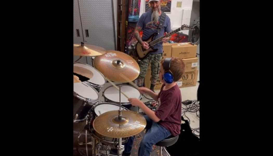 Watch ANTHRAX’s SCOTT IAN Play HELMET’s ‘In The Meantime’ With His 10-Year-Old Son