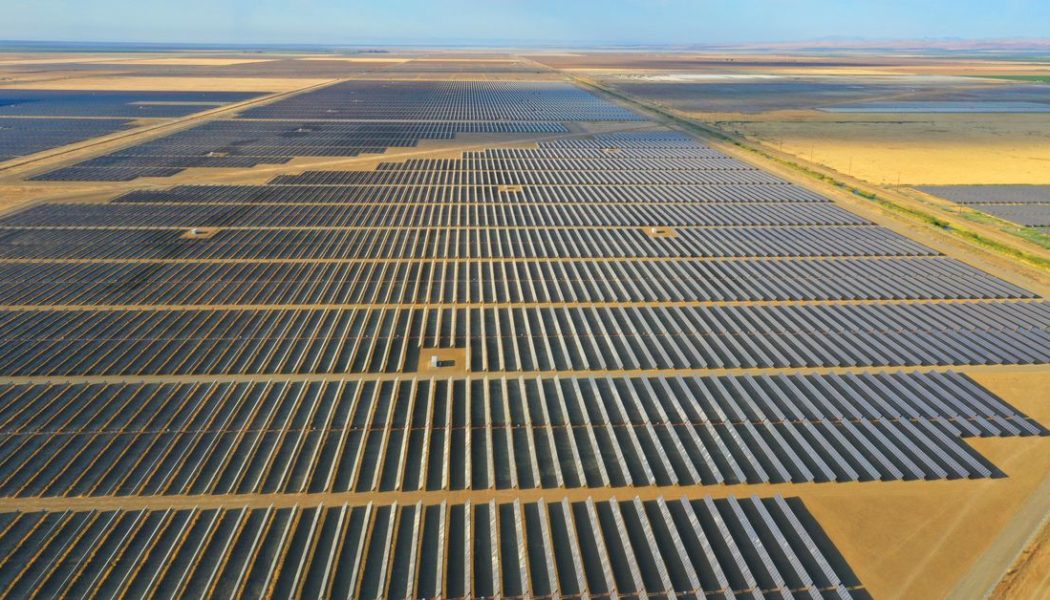 Clean energy broke records in 2021 but still can’t catch up with oil and gas