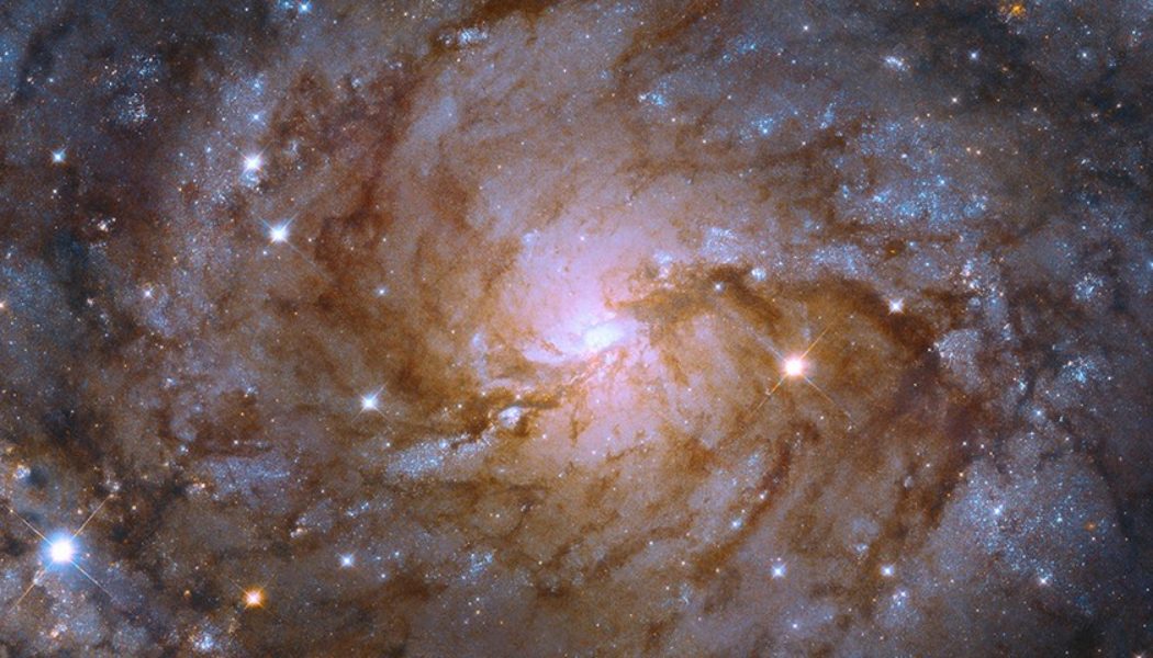 NASA’s Hubble Space Telescope Captures a “Hidden Galaxy”