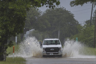 Fiona dumps more rain on Puerto Rico; troops rescue hundreds