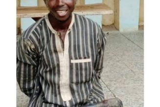 Man capture smiling after arrest for killing his parents with a pestle in Jigawa