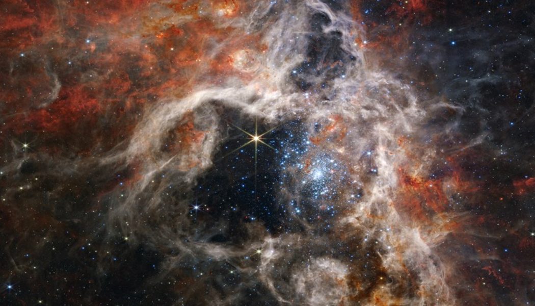 NASA Shares Dazzling Images of a Cosmic “Space Tarantula”