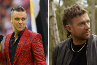 Robbie Williams: Instead of Speaking, Damon Albarn Should “Remove a Few Ribs and Give Himself a Nosh”