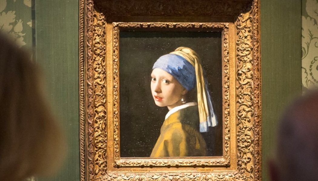 Activist Glues Head to Vermeer’s ‘Girl with a Pearl Earring’