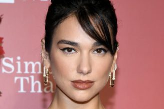 Dua Lipa Gives Wednesday Addams Halloween Costume an Edgy Update in Cutout Shirt