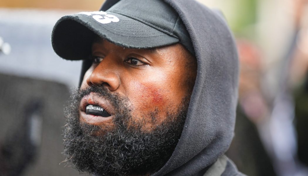 Kanye West Plays James Blake Collaboration, Wears “White Lives Matter” Shirt at Paris Fashion Week Show